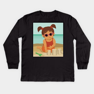 Cute little summer girl is on vacation building a sand castle on the beach Kids Long Sleeve T-Shirt